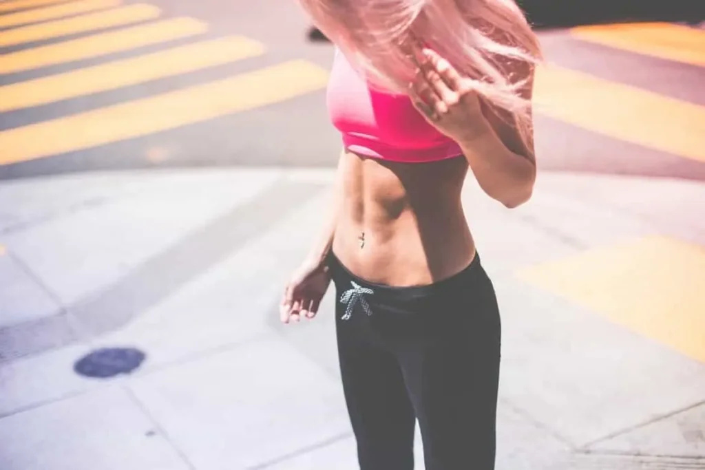 Woman with toned stomach after LA-EMS Body Sculpting Treatment South Ruislip